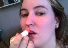 Putting some lip balm on