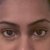 putting on concealer